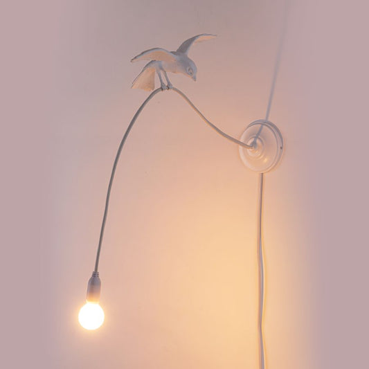 Sparrow cruising wall lamp